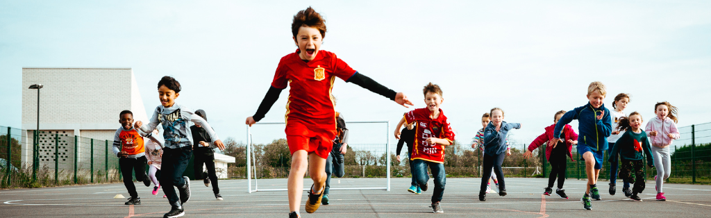 Children running at a Summer Holiday Camp