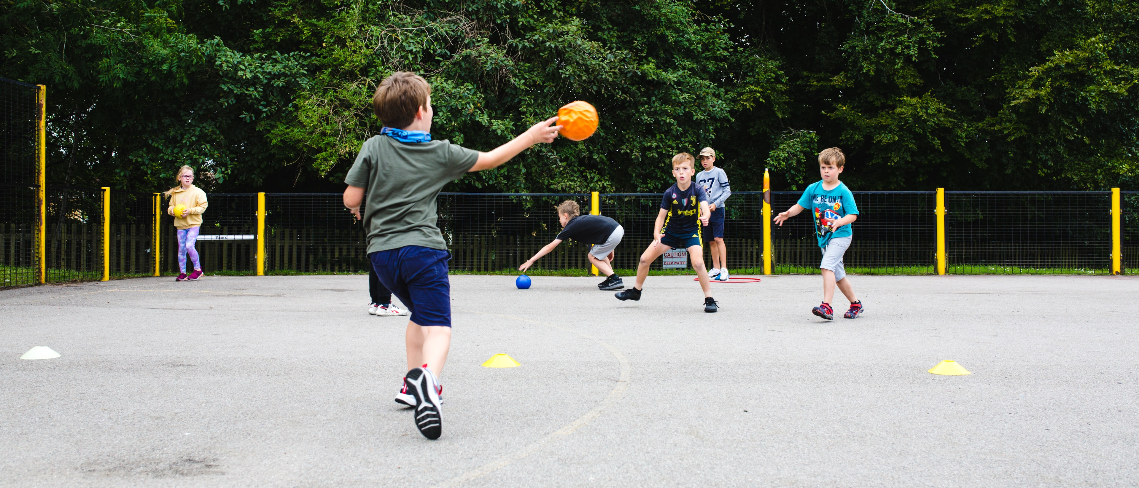 Young people often enjoy ball games.